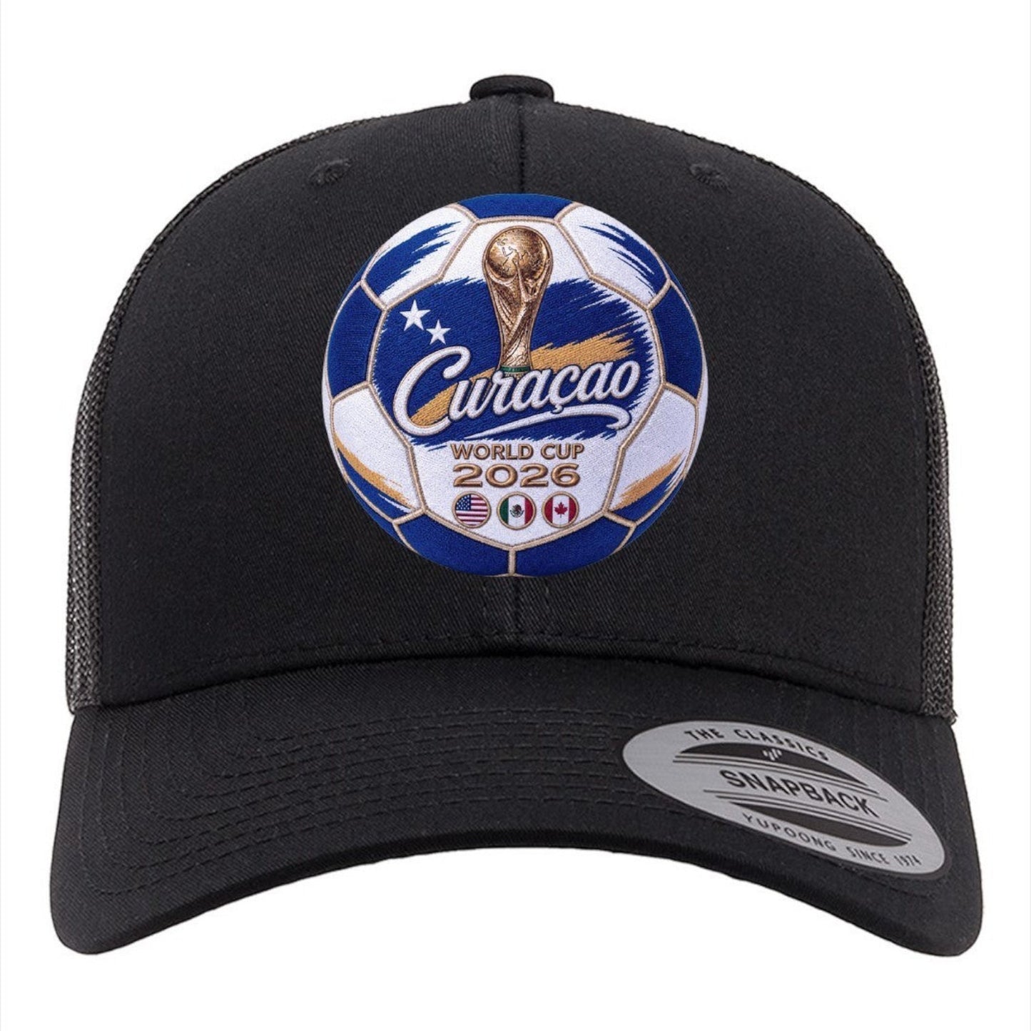 Black trucker hat with embroidered soccer ball patch featuring Curacao, World Cup 2026, and host nation flags. ColChiTex LLC.